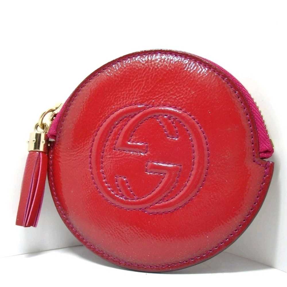 Gucci Interlocking G Coin Case in Patent Leather.